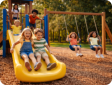 Kids playing on the playground in our campground.