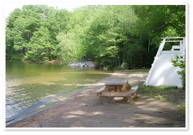 One of the many beaches you can access on Duncan Lake from our campground.